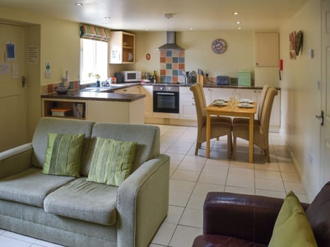 Living room with sofa bed | Lily Pad 5 - Lily Pad Cottages, Nassington, near Stamford