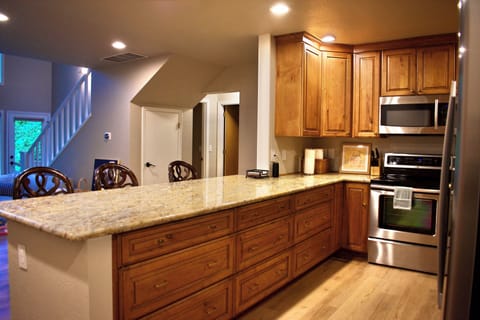 Enjoy a home cooked meal with plenty of counter space for prepping.