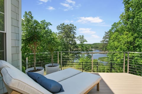 Relax on the deck overlooking the river