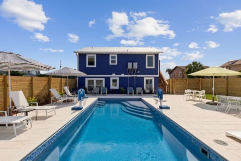 View of 15' x 30' pool with main house in background facing east.