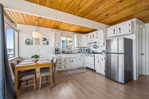 Kitchen is stocked with bakeware and appliances!