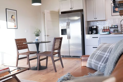 Dining area with table and chairs for 2