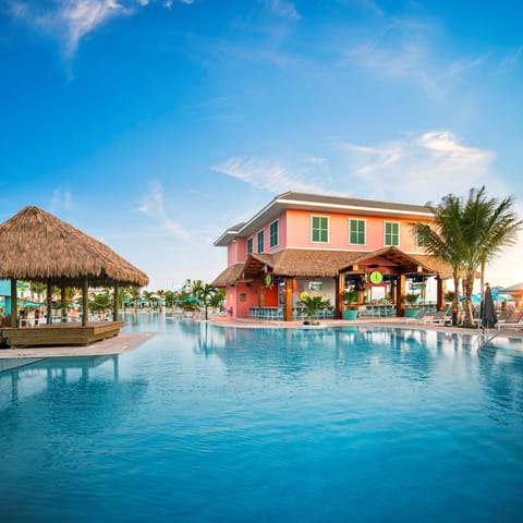Dive into sunlit bliss with sparkling lagoon-style pool views.