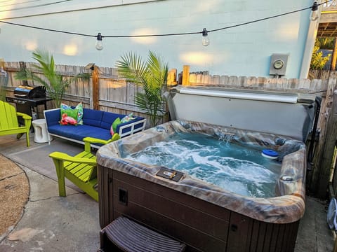 Watch a movie in the private hot tub! 
