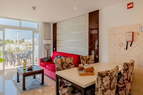 Dine indoors, then drift outside to the sea-view terrace.