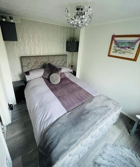 Additional storage facilities with wall mounted cupboards in bedroom