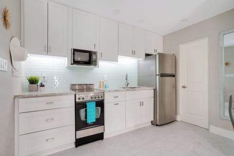 FULL KITCHEN, FULL SIZE REFRIGERATOR.