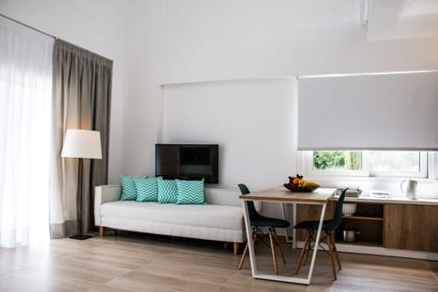 Interior view with pool access – Bright space with dining and lounge visibility.

