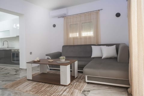 Lounge Area Details – Sofa and Coffee Table – Perfect spot for relaxing or socializing indoors.