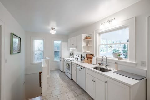 Use a stylish Italian refrigerator, plus a full-size oven and dishwasher for easy, everyday cooking.