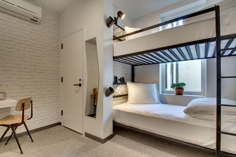 Stretch out in smart bunk-style sleeping for flexible stays.