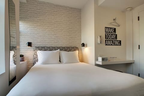 Bedroom. Interior and views may vary by availability.