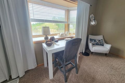 Master bedroom workstation overlooks the lake views