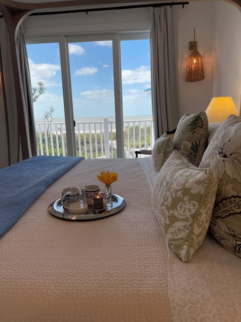Primary suite ocean view from bed