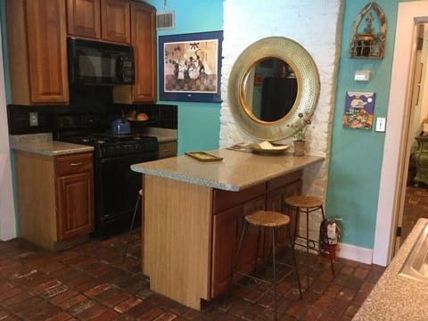 Our kitchen is fully stocked with anything you might need , including coffee, tea, paper towels and bottled water. We even provide some Louisiana Spices! Bring your own food and cook it on our gas stove and oven. We also  provide a microwave oven!