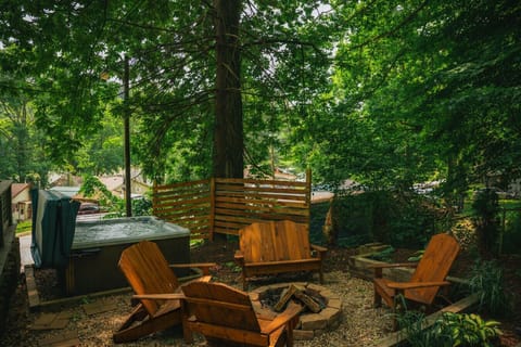 Unwind under the trees with a soak in the hot tub or fireside chats in Adirondack chairs- your private retreat awaits.