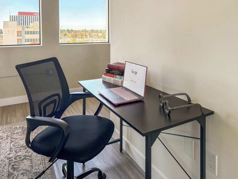 Optimize your workspace with a comfortable office desk paired with an ergonomic chair.