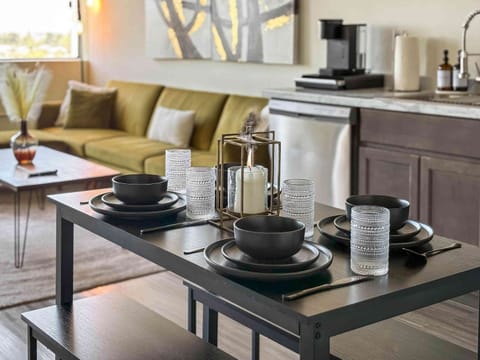 Charming dining area: Seats 4, includes full dinnerware set.