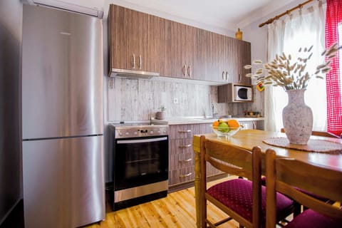 Modernly designed kitchen, with stove and fridge