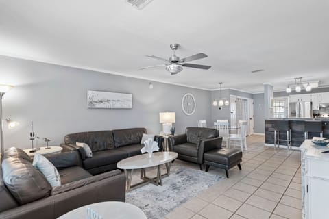 Spacious Living Room with Large TV 