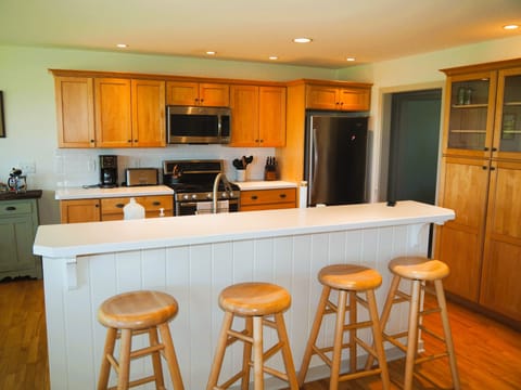 KITCHEN:  The home has an excellent kitchen will all appliances (including a dishwasher) and a good supply of cooking and dining utensils.