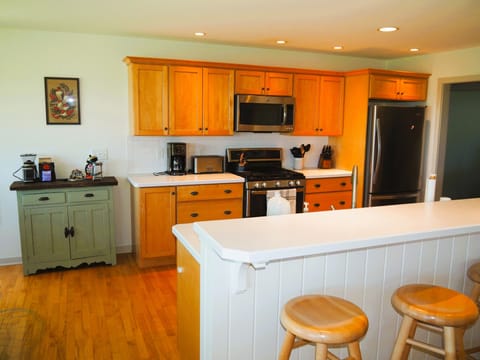 KITCHEN:  The home has an excellent kitchen will all appliances (including a dishwasher) and a good supply of cooking and dining utensils.