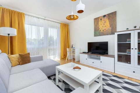 The stylish bedroom includes two comfortable sofa beds.