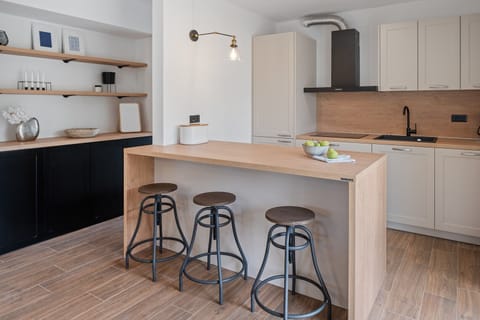 The kitchen island has all the amenities a modern guest needs