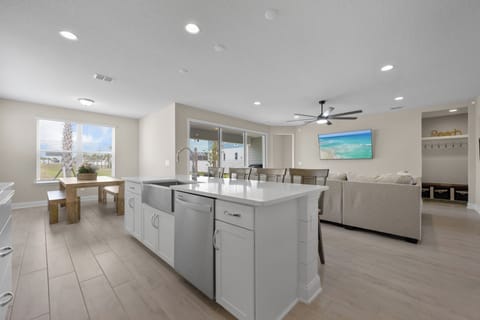 Kitchen into dining room and living room view