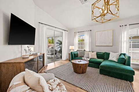 Living Room w/ Smart TV | Walks out to Screen in Porch & Pool!