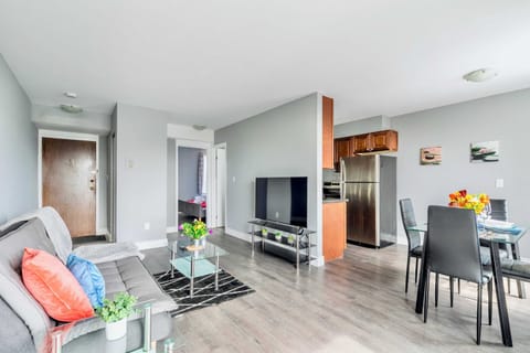 Open Living And Dining Area With Stylish Furniture And A Modern Kitchen