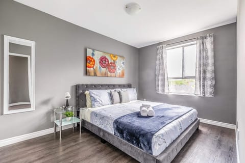 Queen Bed In A Bright Guest Room