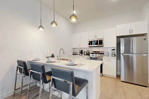 Experience culinary excellence in a well-equipped kitchen, where every detail is crafted for efficiency and enjoyment.