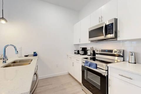 Experience culinary excellence in a well-equipped kitchen, where every detail is crafted for efficiency and enjoyment.