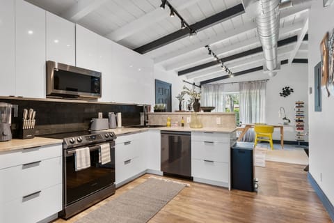 kitchen equipped with all European Alessi appliances- toaster, kettle, blender
