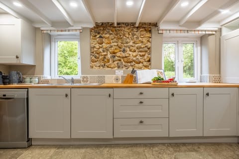 Ground floor: The kitchen also features flint walls