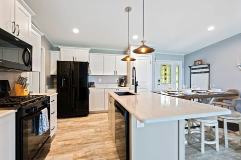 Unleash your inner chef in this stylish kitchen – where cooking dreams come to life, one dish at a time. Welcome to your culinary haven.