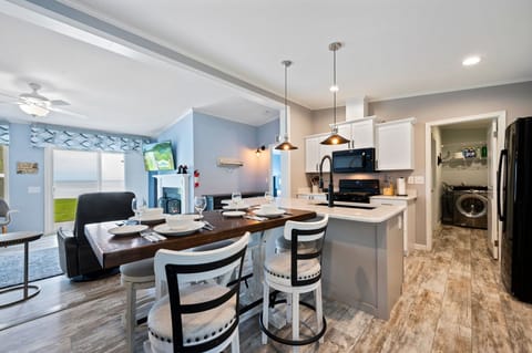 Gather, feast, and savor unforgettable moments around this elegant dining table – where conversations flow as effortlessly as the ambiance.