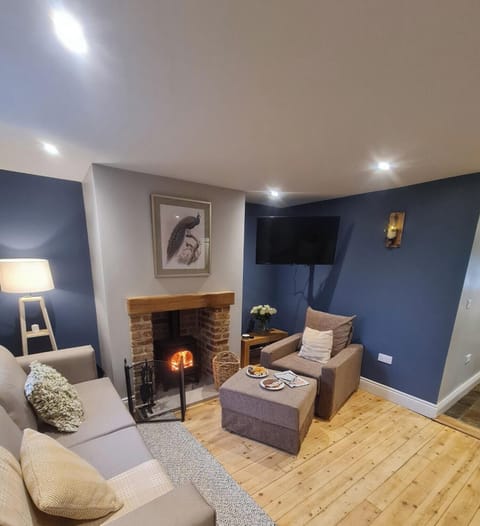Spacious lounge with cosy furnishings