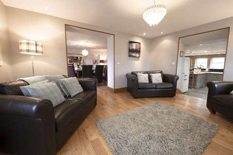 Ground floor: Small sitting room leading to dining area