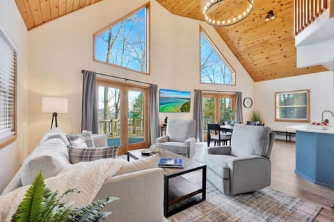 Designed for gathering, easy flow and upscale, relaxed lake living. 