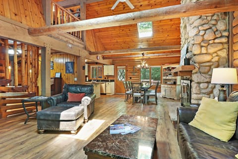 Main living area featuring living room, dining area, and kitchen