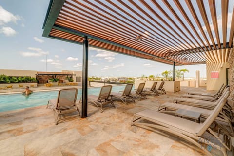 Enjoy spending the day at the rooftop pool