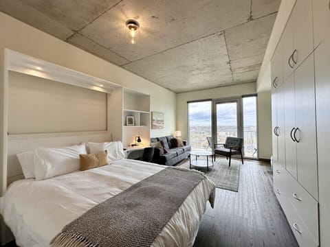Murphy bed that folds up into a dining table/workspace
