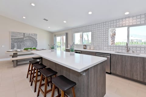 There is plenty of seating at the bar and dining table