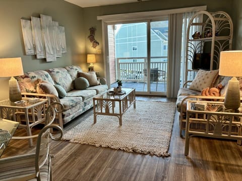 Relax in this cozy, coastal-inspired living room, full of peaceful charm.
