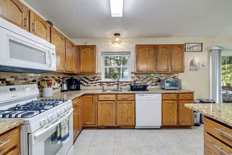 Prepare delicious meals in our modern kitchen, complete with ample counter space