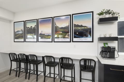 Main Level: Dining Room seating 10 at table and seating 9 at bar counter