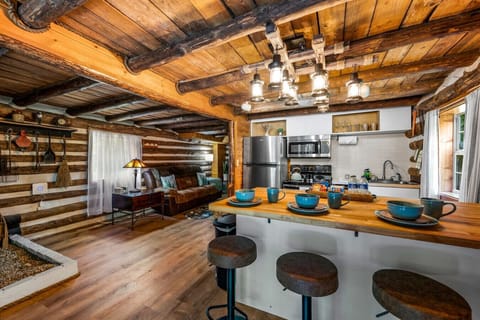 The kitchen is fully equipped with everything you need to make meals at the cabin.