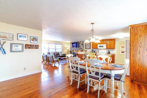 View from entry door looking at kitchen and family room